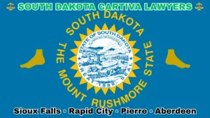 SOUTH DAKOTA CARTIVA LAWYERS: Sioux Falls, Rapid City, Pierre, and Aberdeen text on SD state flag adorned with a big toe and foot depicted on a blue field near the official seal and words "THE MOUNT RUSHMORE STATE"